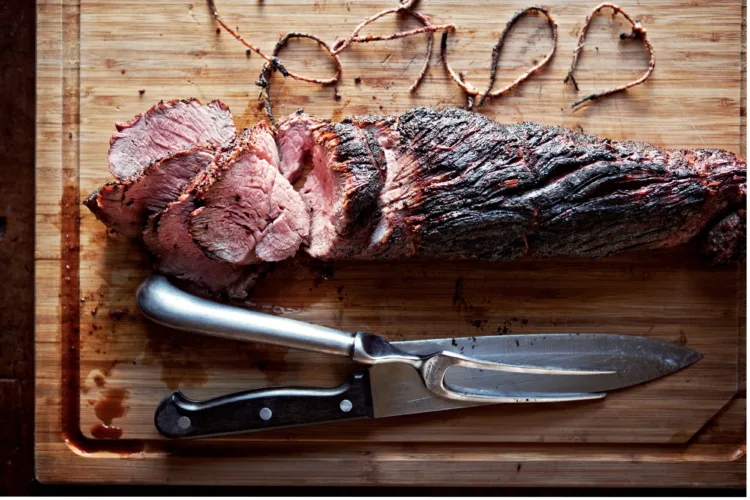 This smoky, fire-kissed beef tenderloin with herb butter comes from Canal House